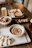 Close-up of a colorful Lebanese mezze platter with hummus, tabbouleh, and grilled skewers.