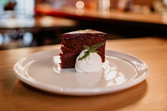 A cozy scene showing a customer happily enjoying a piece of chocolate dessert from the cake corner.