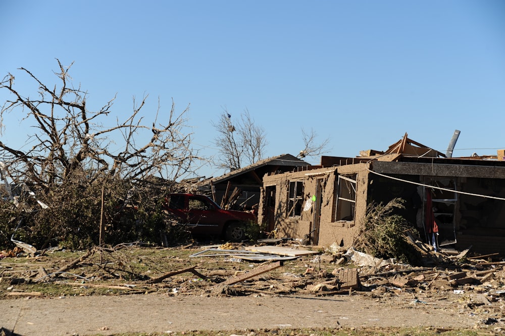 a house that has been destroyed by a tree