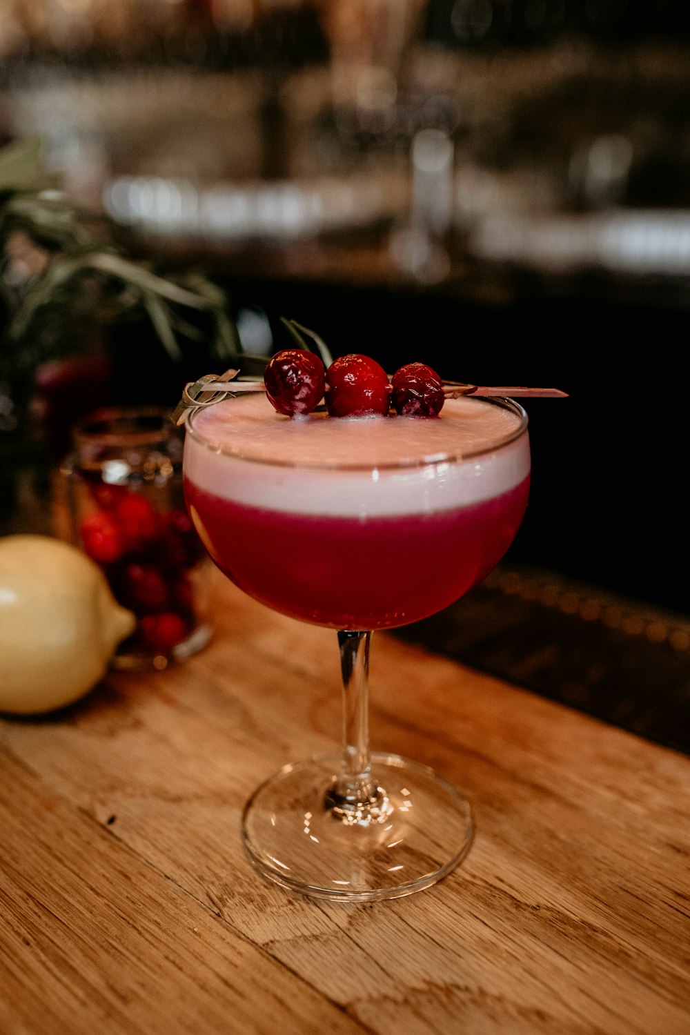 a drink sitting on top of a wooden table