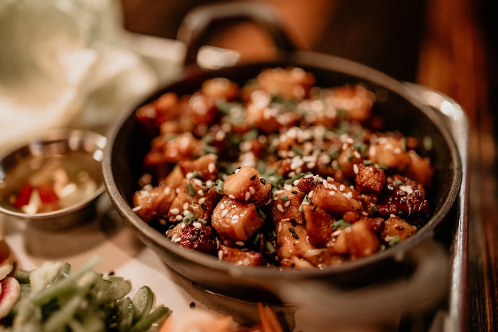 a close up of a pan of food on a table