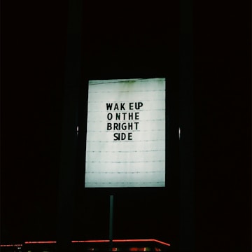 Mr Opportunities standing beside a bright, glowing opportunity sign.