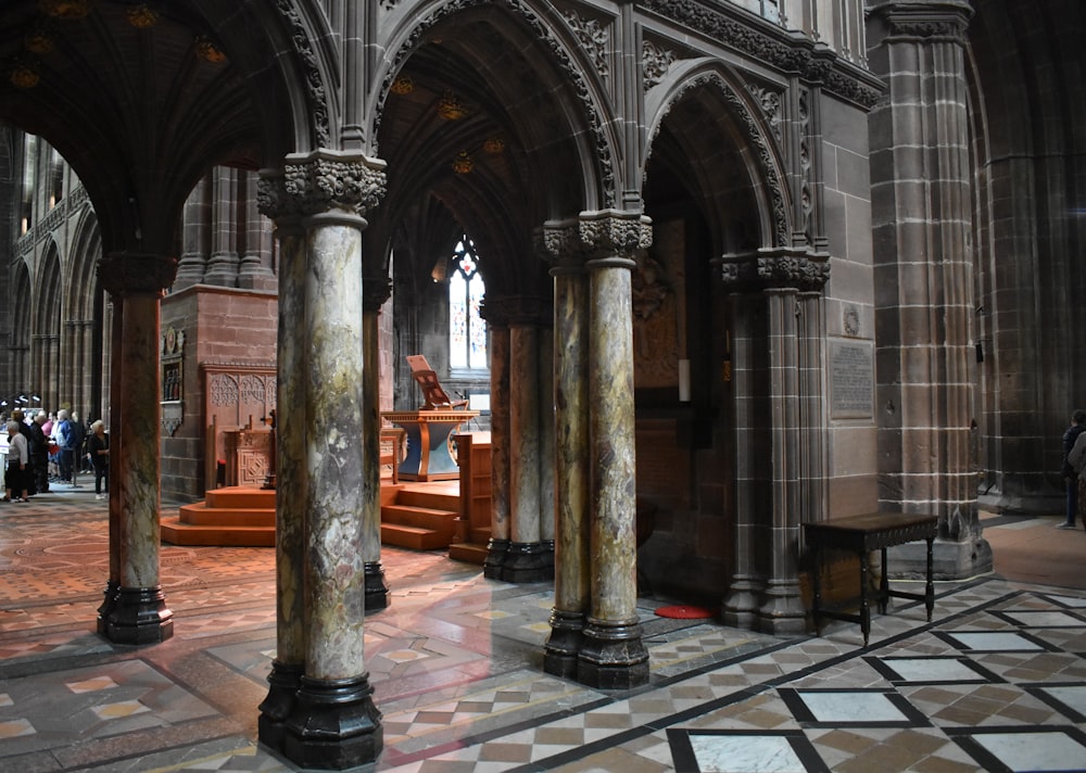 a large cathedral with columns and a statue