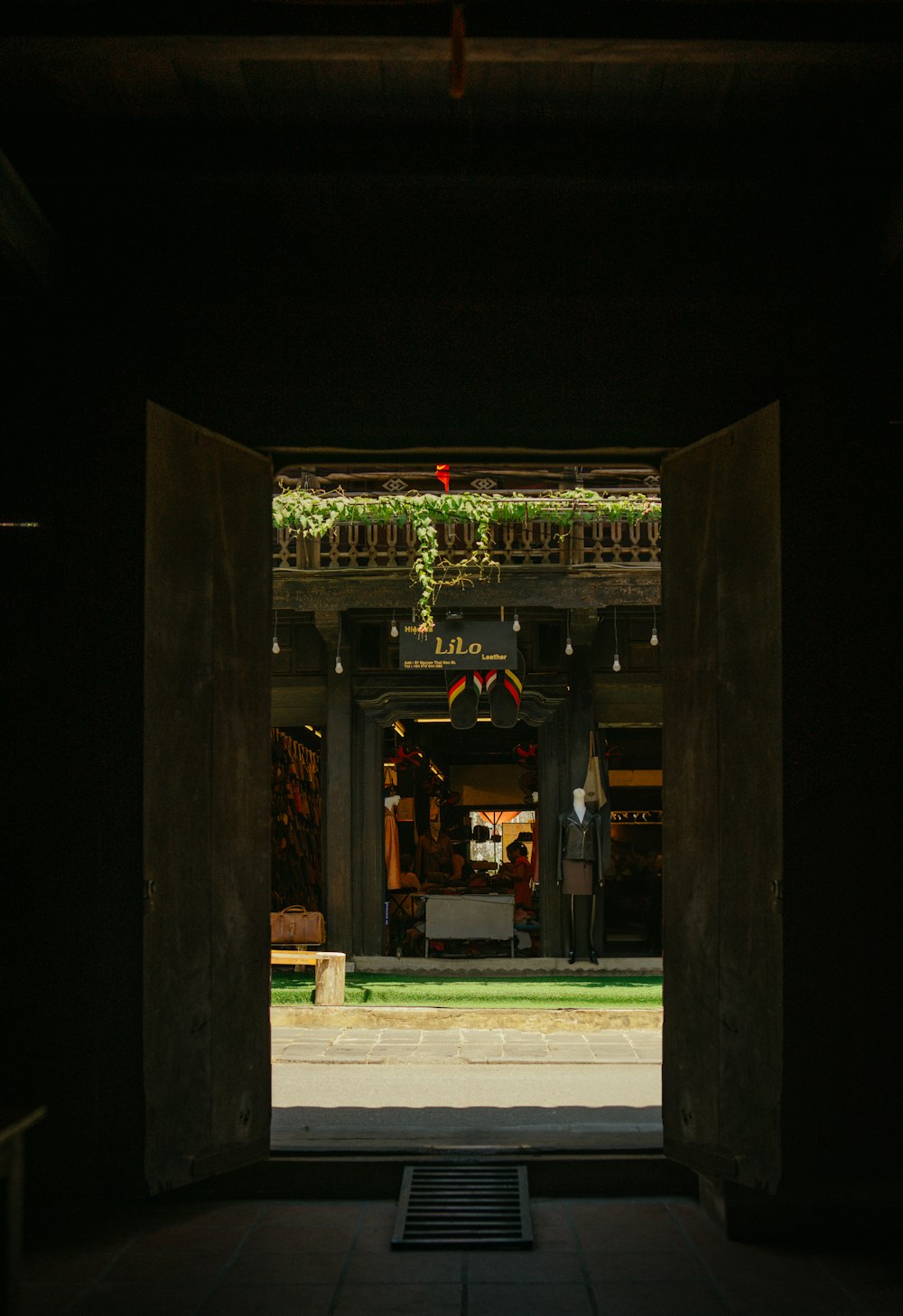 an open doorway leading into a dark room