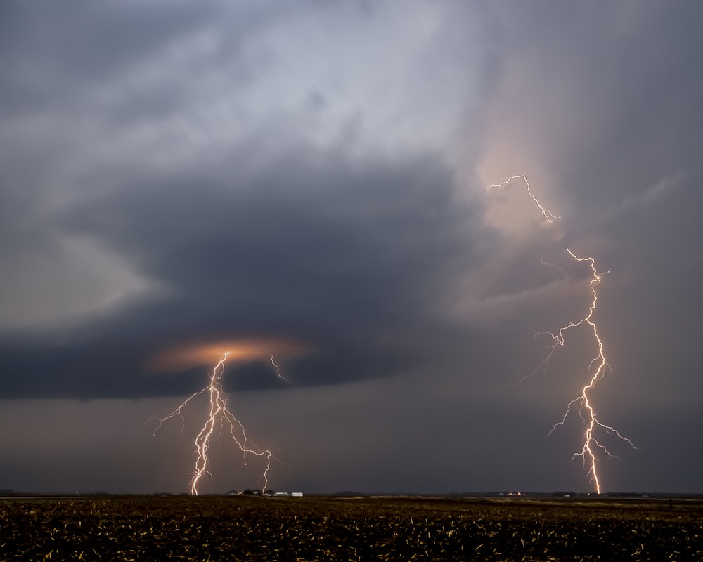 a large cloud filled with lots of lightning