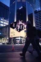 Local businesses showing support with banners at a youth sports event.