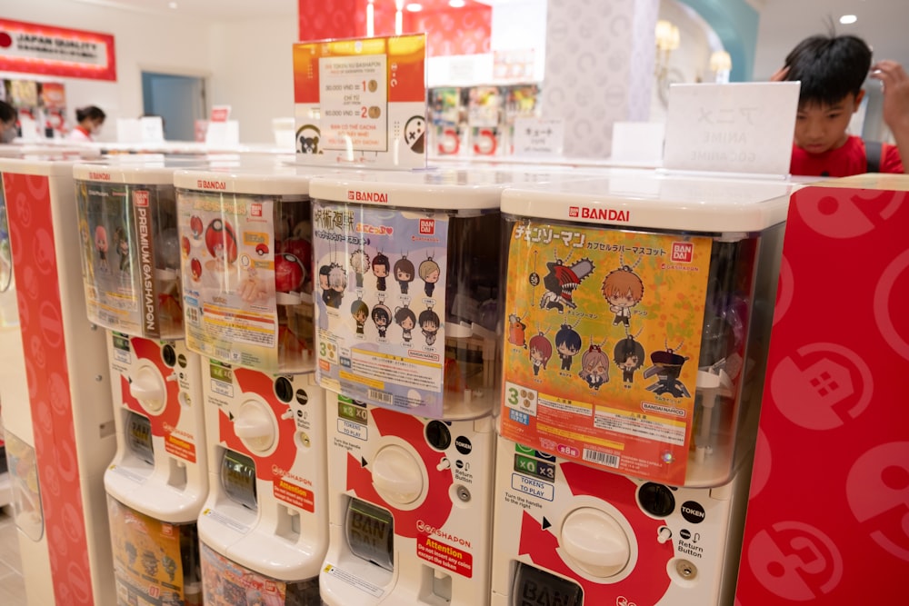 a row of vending machines in a store