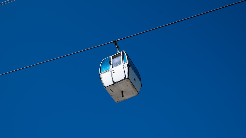 a cable car going up in the sky