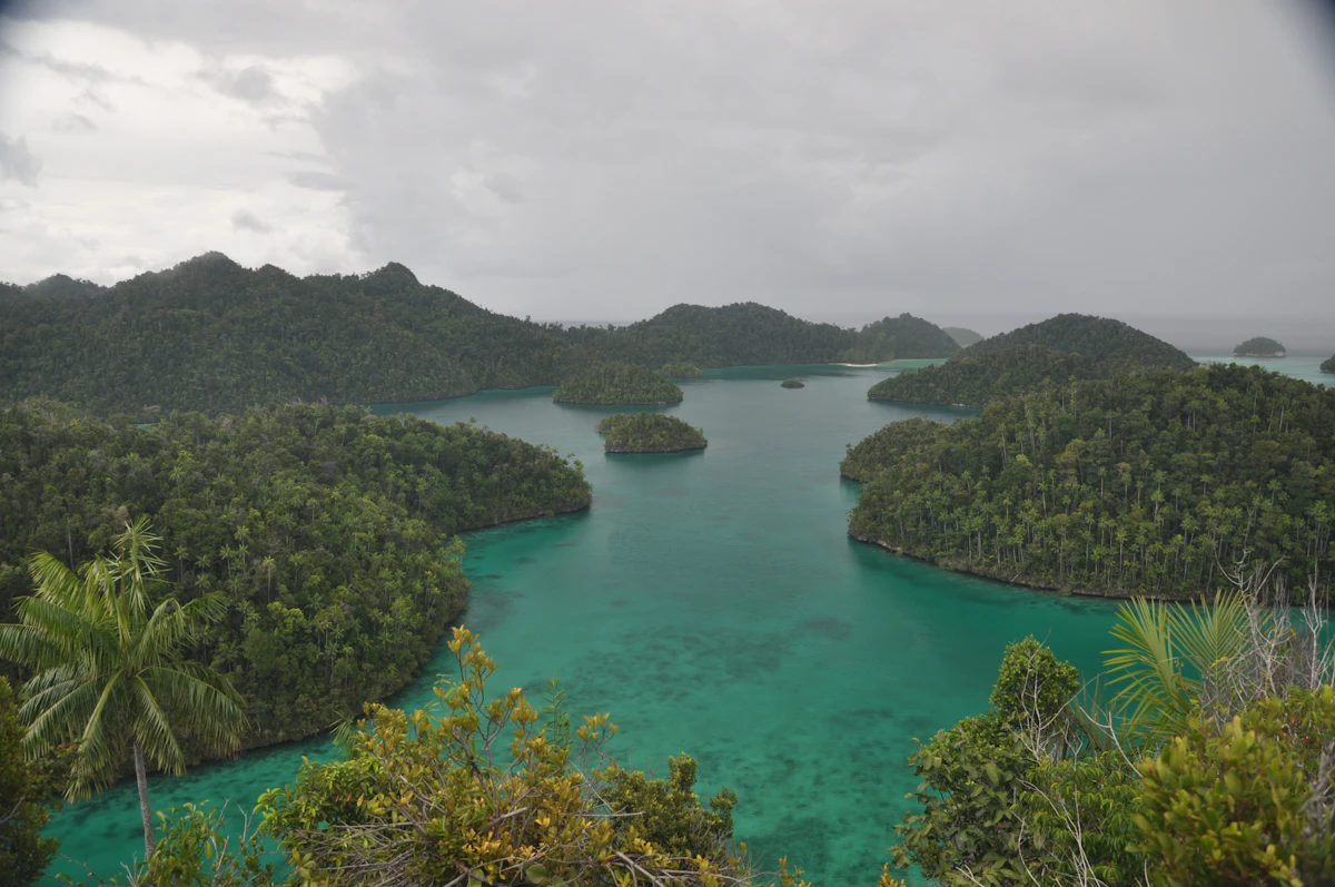 Secluded tropical island coastline and pristine coral atolls of Bintan