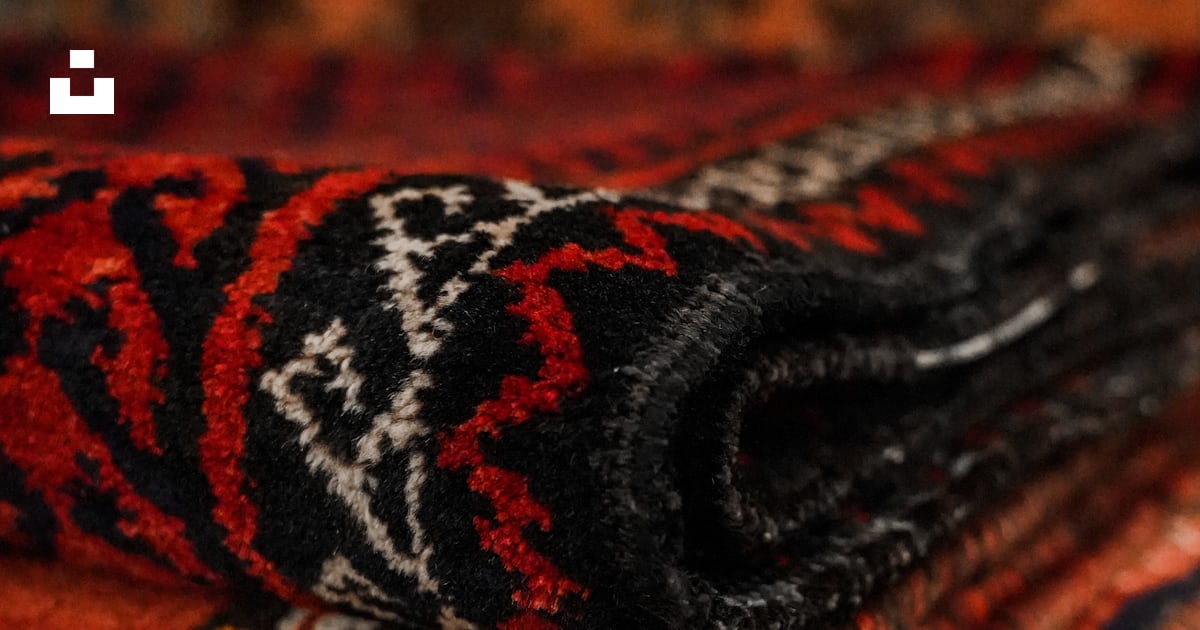 A pile of rugs stacked on top of each other photo – Free Iran Image on ...