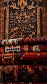 a pile of rugs sitting on top of a rug