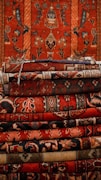 a pile of rugs sitting on top of each other