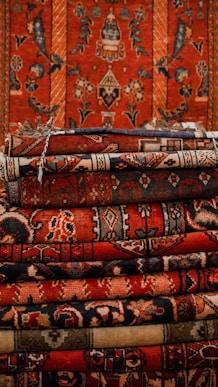 a pile of rugs sitting on top of each other