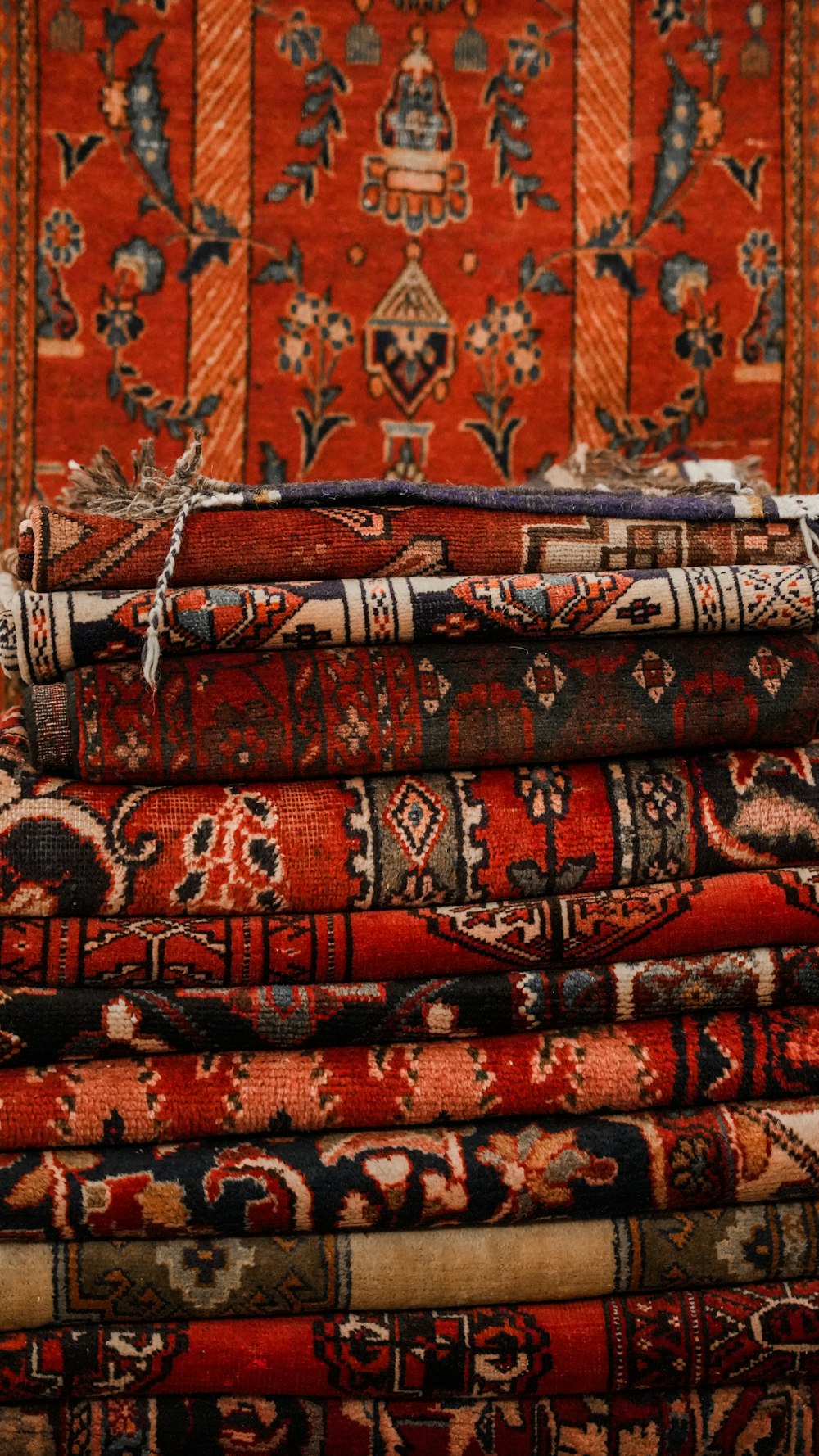 a pile of rugs sitting on top of each other