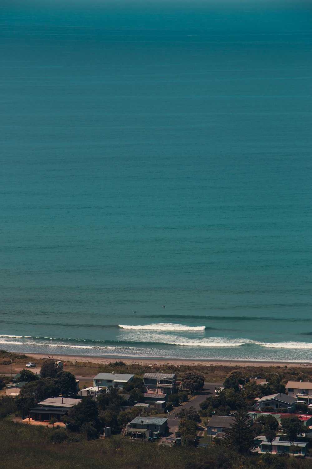 a person riding a surfboard on a wave in the ocean