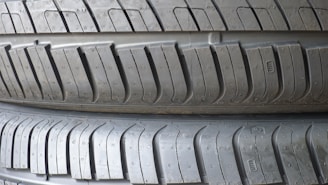 a close up of three tires stacked on top of each other