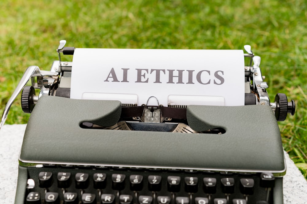 a close up of a typewriter with a paper on it