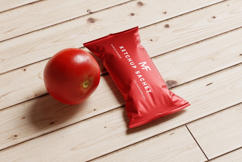 a bag of protein bar next to a tomato