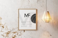 Close-up of a sleek LED frame displaying a vibrant family photo on a mantelpiece.