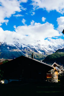 Snow-capped mountains towering over a peaceful alpine village