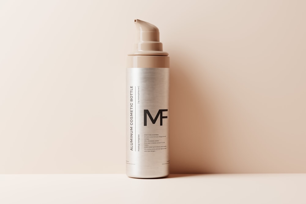 a bottle of mf cosmetics on a table