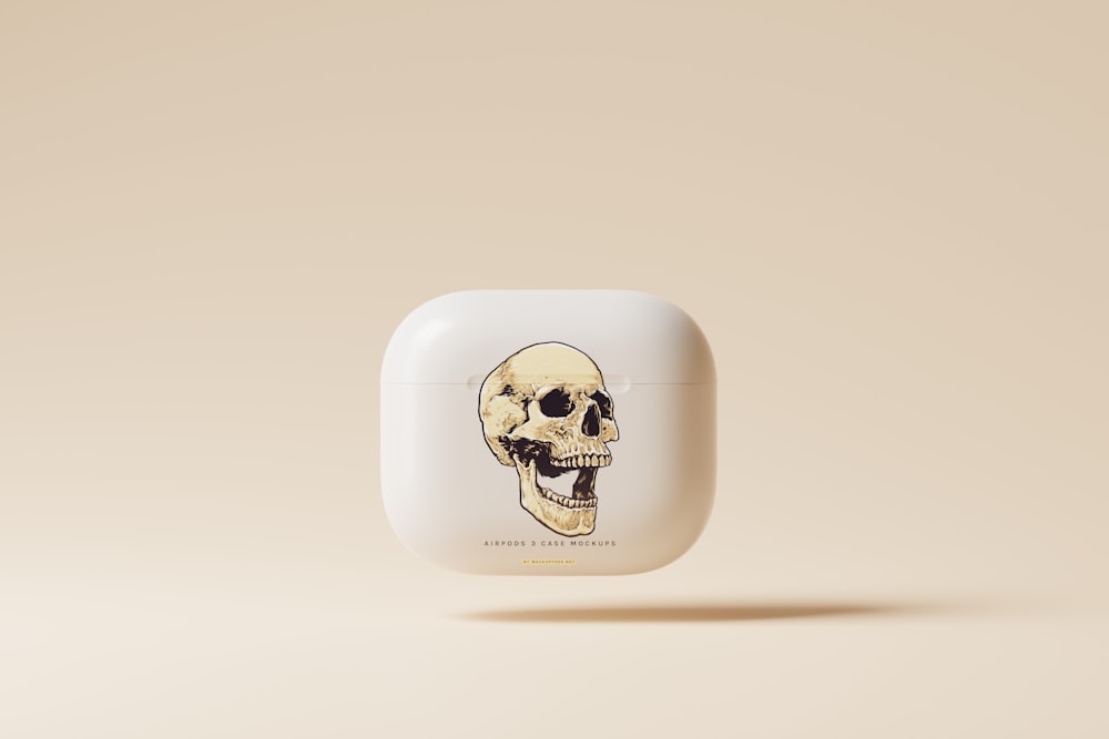 a white case with a picture of a skull on it