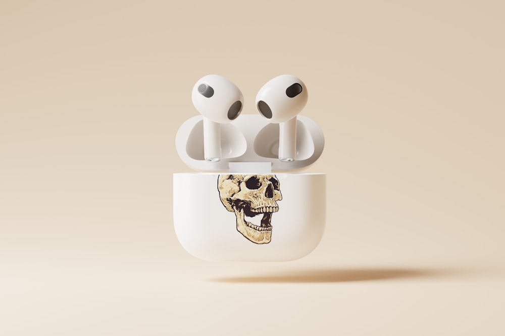 a pair of headphones with a skull on them