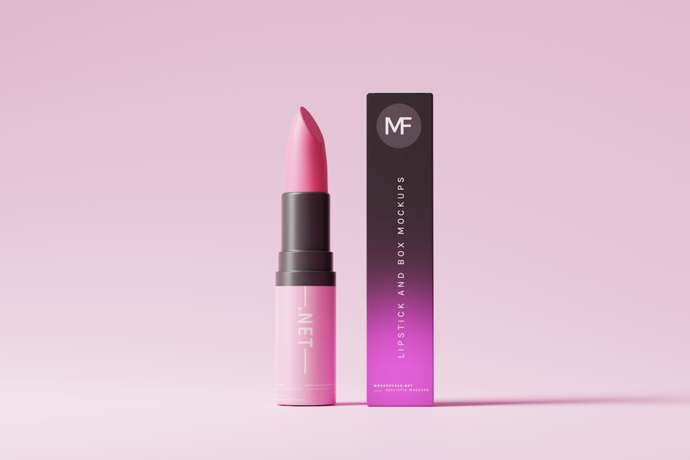 a pink lipstick is next to a pink box