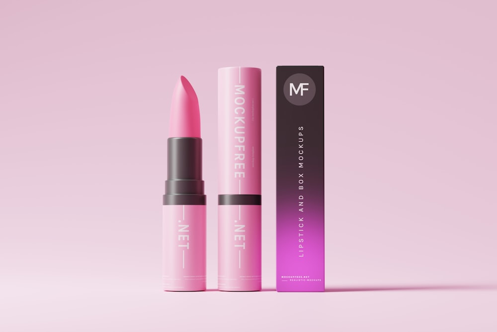 a pink lipstick is next to a pink box