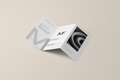 a folded brochure with a black and white image