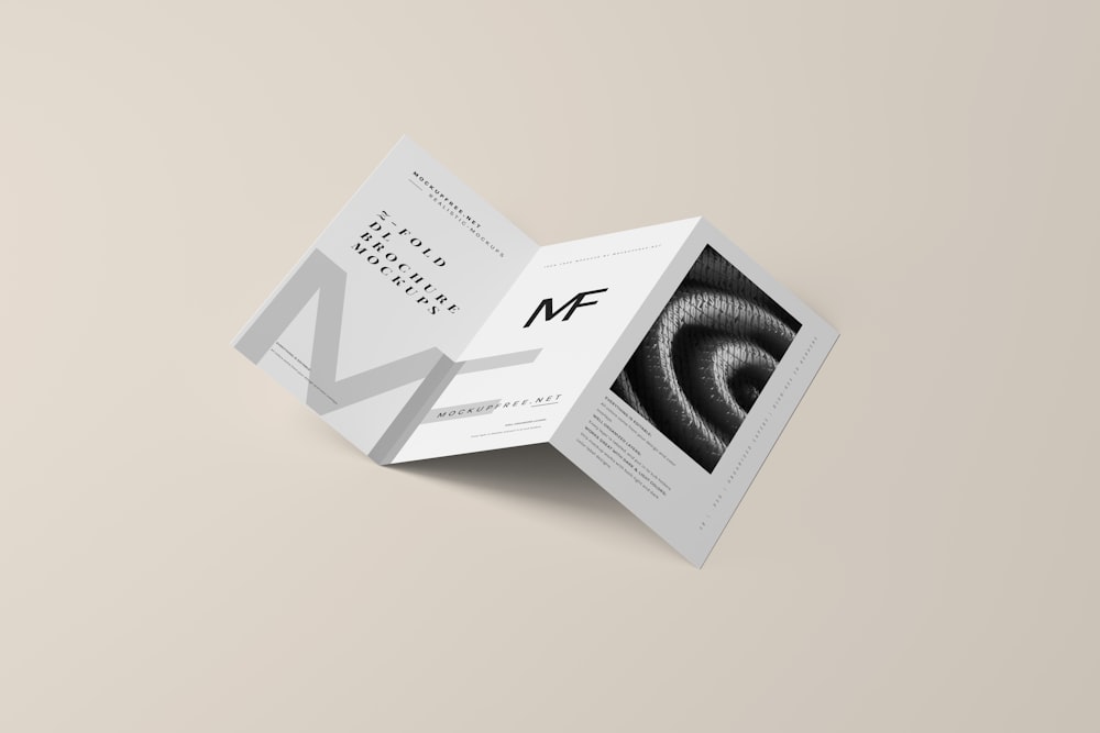 a folded brochure with a black and white image