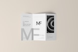 a folded brochure with a black and white photo