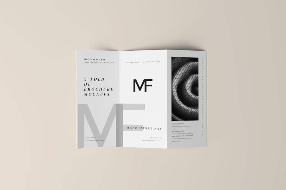 a folded brochure with a black and white photo