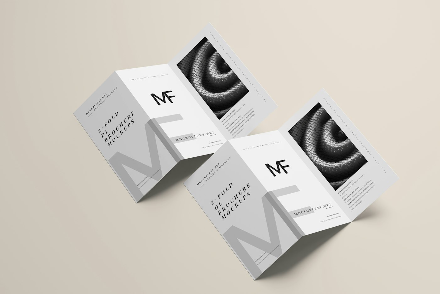 Two folded brochures lying on top of each other