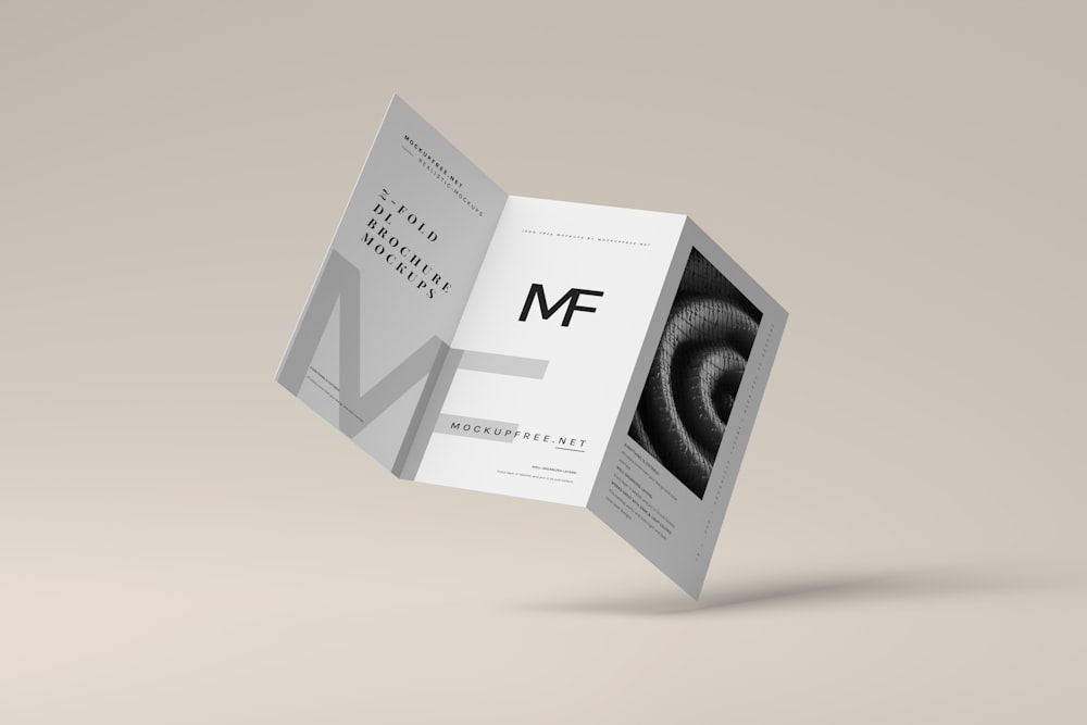 a folded brochure with a black and white photo