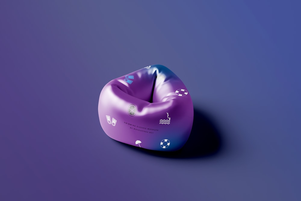 a purple bean bag sitting on top of a purple surface