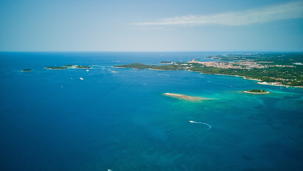 an aerial view of a small island in the middle of the ocean