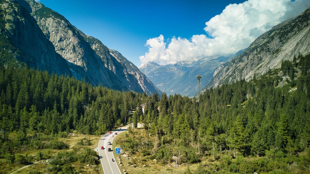 a scenic view of the mountains and trees