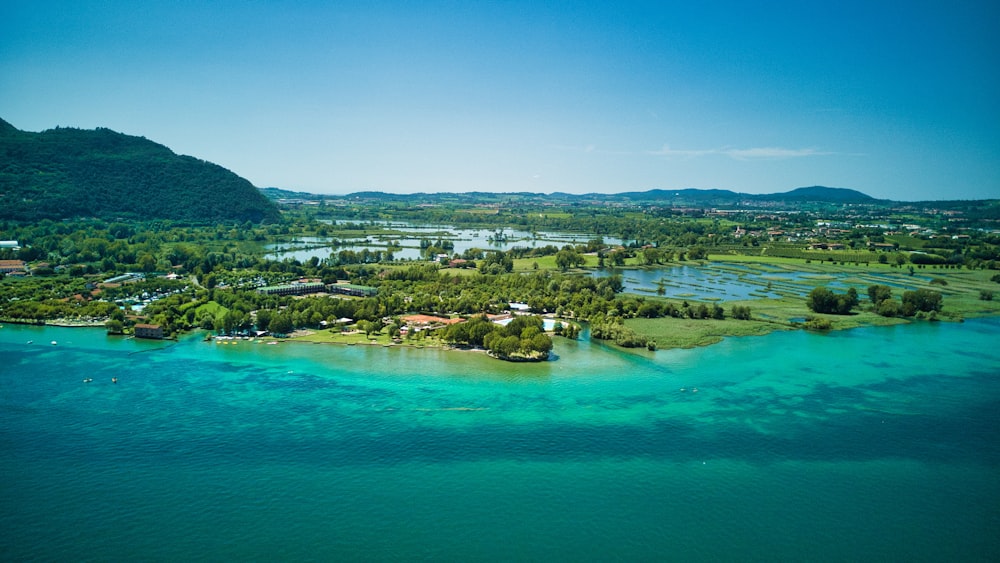 an aerial view of a small island in the middle of the ocean