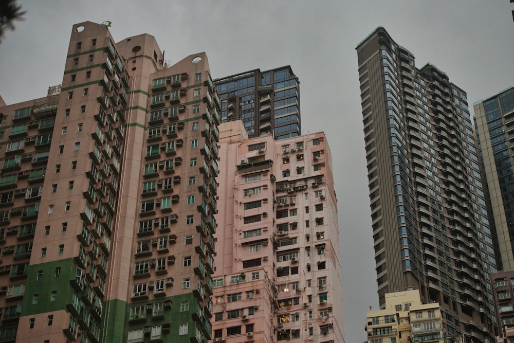 a group of tall buildings sitting next to each other