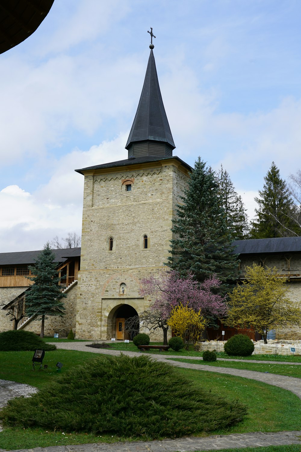 a church with a steeple and a clock tower