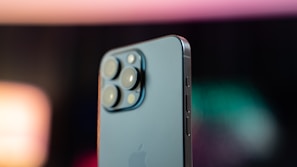 A close-up view of a Huawei phone highlighting its camera features.