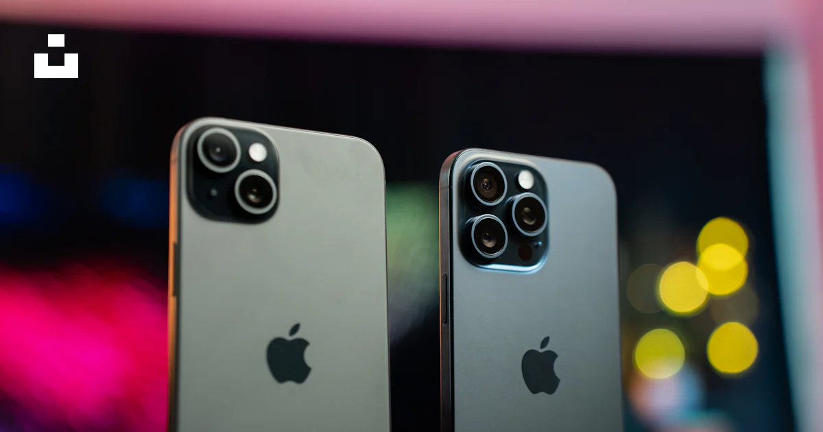 Two iphones side by side on a table photo – Free Iphone Image on Unsplash