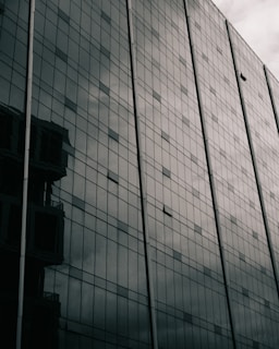 Exterior shot of a high-rise building with glass windows.