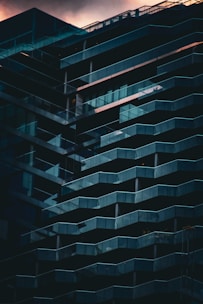 a tall building with balconies on the side of it