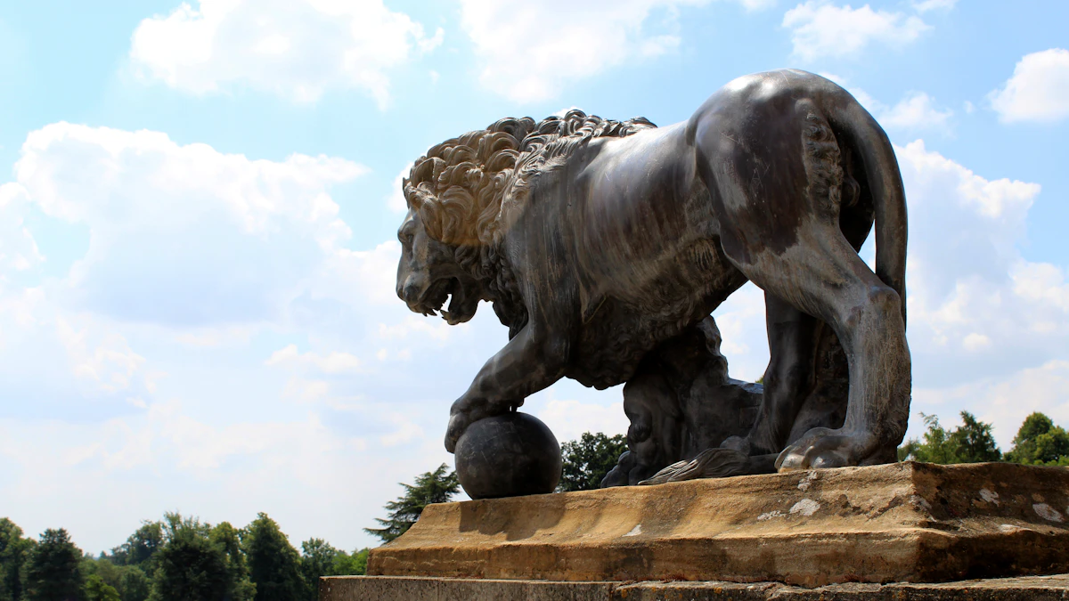Bronze lion with its paw on a globe