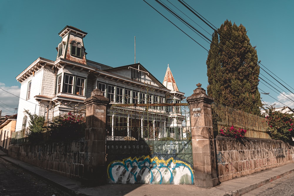 an old building with graffiti on the side of it