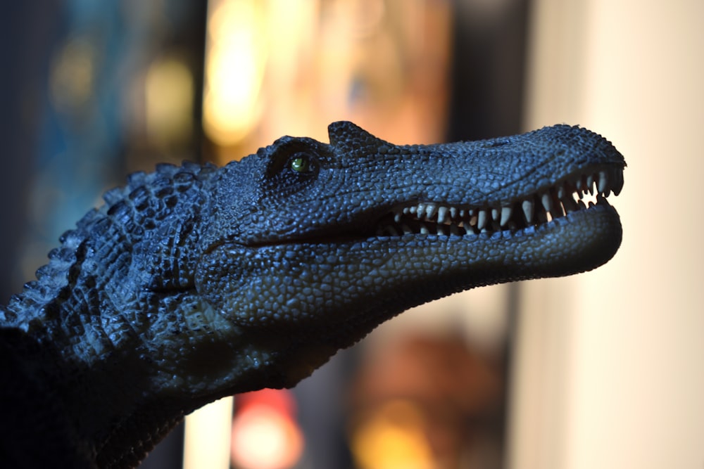 a close up of a fake alligator head