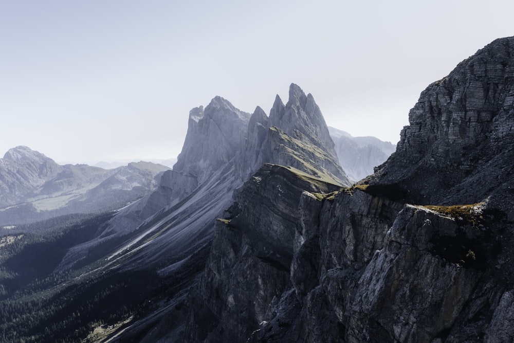 a view of a mountain range from the top of a mountain