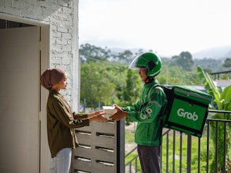a person in a green jacket and a person in a green jacket